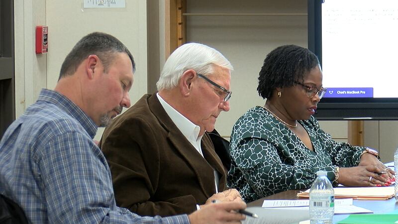 Cache community members join hands to petition at school board meeting