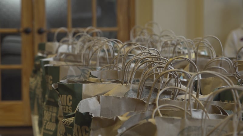 FILE - Bags of groceries were handed out to those in need at the Friendship Baptist Church in...