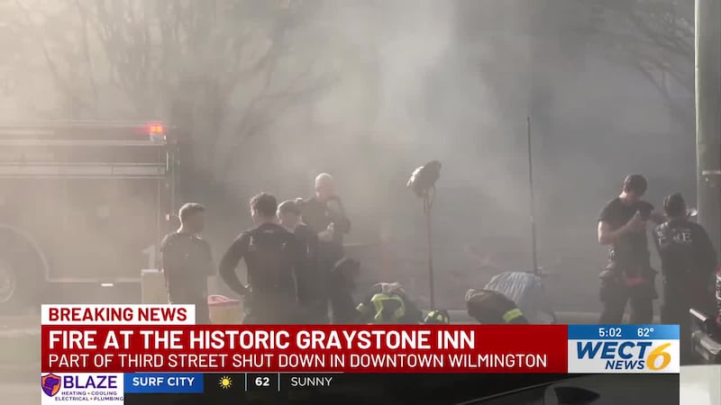 Many downtown residents gathered across the street from the Graystone Inn to witness the fire.